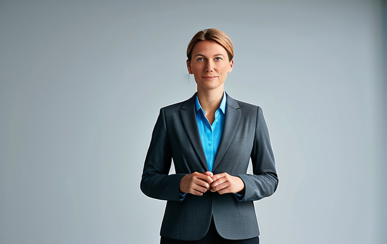 A confident professional German businesswoman, mid-30s, looking directly at the viewer with an engaging and thoughtful expression. Dressed in a modern, dark grey business suit, fully buttoned, with a light blue blouse, professional dress, appropriate attire. Standing in a sleek, bright, modern office space. In the background, subtle, abstract lines of data or code visually transition into warm, glowing, interconnected human silhouettes or light streams, symbolizing the transformation from data to emotional connection. The overall atmosphere is sophisticated and innovative. High-resolution professional studio photography, soft lighting, perfect anatomy, correct proportions, well-formed hands, proper finger count, natural pose, realistic details, appropriate content, safe for work, fully clothed, professional.